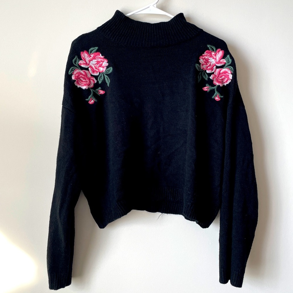 Embroidered black sweater